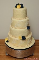 4 tier wedding cake handmade roses.jpg