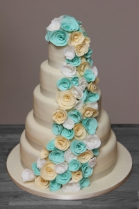 wedding cake turquoise ivory roses